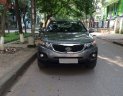 Kia Sorento 2.4AT  2011 - Nhà mình cần bán chiếc xe Kia Sorento đời 2011 số tự động, màu xám