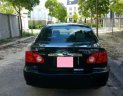 Toyota Corolla altis   2004 - Bán xe Toyota Corolla Altis, màu đen, đời 2004, số tay, nhiên liệu 7 lít, mới đi 12,0000 km