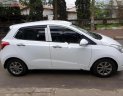 Hyundai Grand i10    1.0 MT 2014 - Cần bán gấp Hyundai Grand i10 1.0 MT năm 2014, màu trắng, xe nhập chính chủ