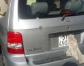 Kia Carnival 2.5 MT 2006 - Cần bán gấp xe Kia Carnival 7 chỗ, Sx 2006, số tay, máy xăng, màu bạ, nội thất màu ghi, đã đi 104000 km