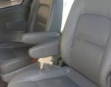 Kia Carnival 2.5 MT 2006 - Cần bán gấp xe Kia Carnival 7 chỗ, Sx 2006, số tay, máy xăng, màu bạ, nội thất màu ghi, đã đi 104000 km