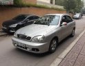 Daewoo Lanos SX 2004 - Cần bán gấp Daewoo Lanos SX 2004, màu bạc