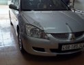 Mitsubishi Lancer 2004 - Cần bán lại xe Mitsubishi Lancer 2004, màu bạc số tự động, giá tốt