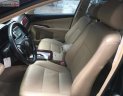 Toyota Camry 2.0E 2013 - Cần bán lại xe Toyota Camry 2.0E năm 2013, màu đen còn mới