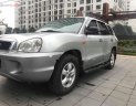 Hyundai Santa Fe Gold AT 2005 - Bán Hyundai Santa Fe Gold màu ghi bạc, 7 chỗ, số tự động, full options, ghế điện máy dầu