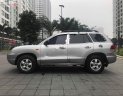 Hyundai Santa Fe Gold AT 2005 - Bán Hyundai Santa Fe Gold màu ghi bạc, 7 chỗ, số tự động, full options, ghế điện máy dầu