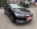 Toyota Corolla altis 1.8AT 2018 - Bán ô tô Toyota Corolla altis 1.8AT năm 2018, màu đen chính chủ, giá tốt