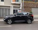 Kia Sportage TXL 2.0AT 2010 - Bán lại xe Kia Sportage TXL 2.0AT 2010, màu đen số tự động