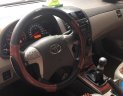 Toyota Corolla altis 1.8G MT 2009 - Bán xe Toyota Corolla Altis 1.8G sx 2009, số tay, máy xăng, màu đen, nội thất màu kem, đã đi 154000 km