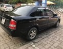 Mazda 323 2004 - Cần bán Mazda 323 năm sản xuất 2004, màu đen, nhập khẩu nguyên chiếc, giá cạnh tranh