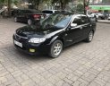 Mazda 323 2004 - Cần bán Mazda 323 năm sản xuất 2004, màu đen, nhập khẩu nguyên chiếc, giá cạnh tranh