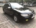 Mazda 323 2004 - Cần bán Mazda 323 năm sản xuất 2004, màu đen, nhập khẩu nguyên chiếc, giá cạnh tranh
