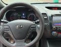 Kia K3 1.6 AT  2013 - Bán Kia K3 1.6 AT số tự động model 2014, Sx 2013, màu vàng 1 đời chủ mới 90%