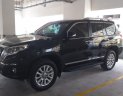 Toyota Land Cruiser TXL 2.7L  Parado  2016 - Bán Toyota Land Cruiser TXL 2.7L Parado sản xuất năm 2016, màu đen, xe chạy gần 25 ngàn