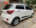 Hyundai Grand i10  1.2 AT 2016 - Cần bán gấp Hyundai Grand i10 1.2 AT sản xuất năm 2016, màu trắng, nhập khẩu 