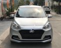 Hyundai Grand i10  1.2 MT Base 2018 - Cần bán lại xe Hyundai Grand i10 1.2 MT Base năm sản xuất 2018, màu bạc  