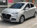 Hyundai Grand i10  1.2 MT Base 2018 - Cần bán lại xe Hyundai Grand i10 1.2 MT Base năm sản xuất 2018, màu bạc  