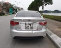 Kia Forte SLi 1.6 AT 2009 - Cần bán xe Kia Forte SLi 1.6 AT 2009, màu bạc, nhập khẩu 