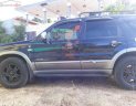 Ford Escape XLT 3.0 AT 2005 - Cần bán xe Ford Escape XLT 3.0 AT 2005, màu đen