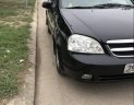 Daewoo Lacetti 1.6EX 2006 - Bán Daewoo Lacetti 1.6EX sản xuất 2006, màu đen, xe nhập