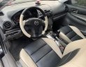 Mazda 6 2.0 MT 2003 - Cần bán gấp Mazda 6 2.0 MT đời 2003, màu đen