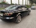 Mazda 6 2.0 MT 2003 - Cần bán gấp Mazda 6 2.0 MT đời 2003, màu đen