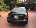 Daewoo Lacetti   2004 - Cần bán lại xe Daewoo Lacetti 2004, màu đen