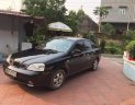 Daewoo Lacetti   2004 - Cần bán lại xe Daewoo Lacetti 2004, màu đen