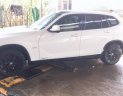 BMW X1 2010 - Cần bán xe BMW X1 2010, màu trắng xe gia đình