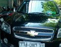Chevrolet Captiva LT 2010 - Cần bán xe Chevrolet Captiva LT đăng ký 2010, màu đen, xe gia đình, giá tốt 347tr