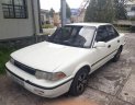 Toyota Corolla   1990 - Cần bán lại xe Toyota Corolla đời 1990, màu trắng, nhập khẩu, xe zin đi 6L/100km