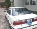 Toyota Corolla   1990 - Cần bán lại xe Toyota Corolla đời 1990, màu trắng, nhập khẩu, xe zin đi 6L/100km