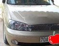 Ford Laser   2003 - Bán xe Ford Laser đời 2003, màu vàng, xe gia đình 