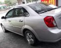 Daewoo Lacetti EX  2011 - Cần bán Daewoo Lacetti EX sản xuất 2011, màu bạc đẹp như mới