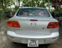 Mazda 3 AT 2004 - Cần bán lại xe Mazda 3 AT sản xuất năm 2004, màu bạc