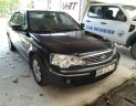 Ford Laser   2004 - Bán ô tô Ford Laser năm sản xuất 2004, màu đen, nhập khẩu