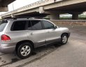 Hyundai Santa Fe 2005 - Cần bán lại xe Hyundai Santa Fe năm 2005, màu bạc chính chủ, giá chỉ 176 triệu