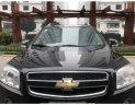 Chevrolet Captiva LT 2009 - Bán xe Chevrolet Captiva LT sản xuất 2009, màu đen ít sử dụng