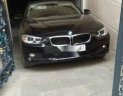 BMW 3 Series 320i  2014 - Cần bán lại xe BMW 3 Series 320i 2014, màu đen, xe nhập xe gia đình