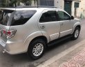 Toyota Fortuner 2013 - Cần tiền bán gấp em cọp Fortuner 2013, số tự động, máy xăng, màu bạc