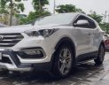 Hyundai Santa Fe 2.2L 4WD 2016 - Cần bán lại xe Hyundai Santa Fe 2.2L 4WD đời 2016, màu bạc như mới