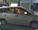 Toyota Innova 2.0E 2014 - Bán Toyota Innova 2.0E đời 2014, màu bạc chính chủ