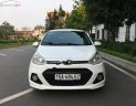 Hyundai Grand i10   1.2 AT 2015 - Cần bán lại xe Hyundai Grand i10 1.2 AT đời 2015, màu trắng, xe nhập chính chủ