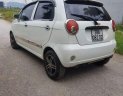 Chevrolet Spark  MT 2010 - Cần bán chiếc xe Spark đời 2010 màu trắng, lốp mới cả dàn