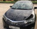 Toyota Corolla altis 2014 - Cần bán xe Toyota Corolla altis sản xuất năm 2014, màu đen