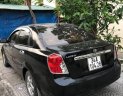 Daewoo Lacetti 2010 - Cần bán lại xe Daewoo Lacetti 2010, màu đen