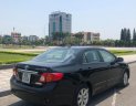 Toyota Corolla altis   2010 - Cần bán Toyota Corolla altis sản xuất năm 2010, màu đen, xe 1 chủ từ đầu