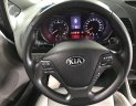 Kia K3 1.6MT 2014 - Bán Kia K3 1.6MT màu trắng, số sàn, sản xuất 2014, Đk 2015 một chủ đi 68000km