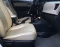 Toyota Corolla altis MT 2015 - Gia đình cần bán xe Altis 2015, số sàn, màu trắng, gia đình sử dụng
