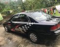 Mazda 626 1997 - Cần bán gấp Mazda 626 năm sản xuất 1997, màu đen, xe nhập 